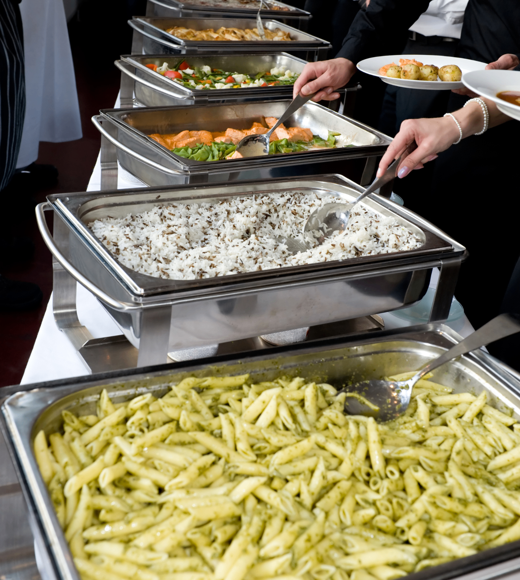 Fresh & Exotic buffet line with pasta, rice, vegetables, and plated service